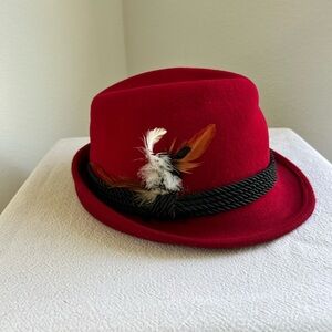 Red hat with feathers